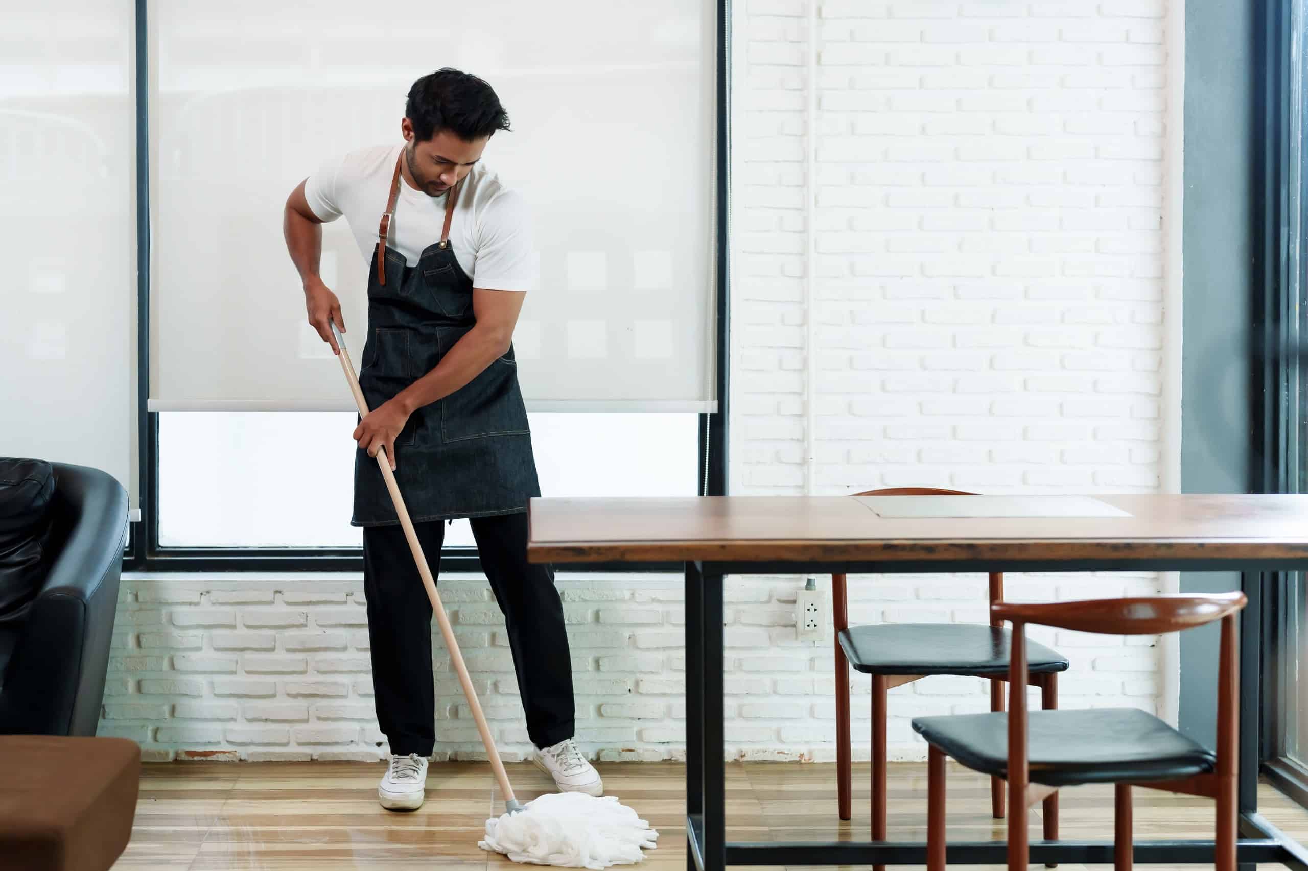 mopping the floor in a cafe